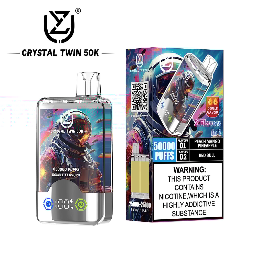 A transparent vape device labeled 'CRYSTAL TWIN 50K' displaying an astronaut design on the front, with a digital puff counter at the bottom, and a vibrant packaging showing flavors 'Peach Mango Pineapple' and 'Red Bull,' along with a nicotine warning.