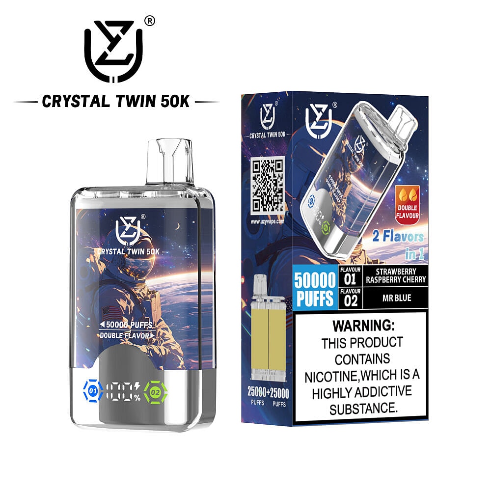 A clear vaporizer labeled 'CRYSTAL TWIN 50K', featuring a futuristic design with a digital display, next to its colorful packaging that indicates it contains two flavors: Strawberry Raspberry Cherry and Mr. Blue, with a warning about nicotine addiction.