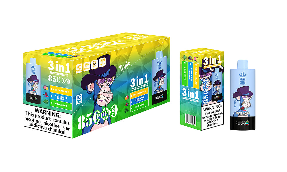A Colorful Packaging Box For A Vaping Product Featuring The Brand 'Bang King', Showcasing A Cartoon Monkey Character Wearing A Purple Hat, And Displaying The Flavors 'Peach Mango', 'Blue Razz Cherry', And 'Cool Mint', With A Warning Label About Nicotine Addiction.
