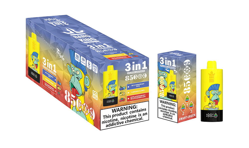 A Colorful Box Of Bang King 3-In-1 Disposable Vapes Featuring Cartoon Monkey Graphics, Showcasing Flavors Such As Blueberry Ice, Lemon Lime, And Strawberry Watermelon, With A Prominent Warning Label About Nicotine.