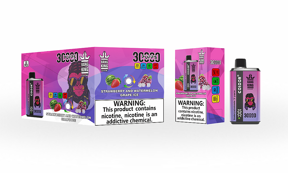Empaque para el vaporizador "Bang King Color" con sabor a "fresa y sandía con helado de uva", con un texto de advertencia en negrita que indica que el producto contiene nicotina. El diseño incluye colores vibrantes y un gráfico de un personaje con gafas de sol.