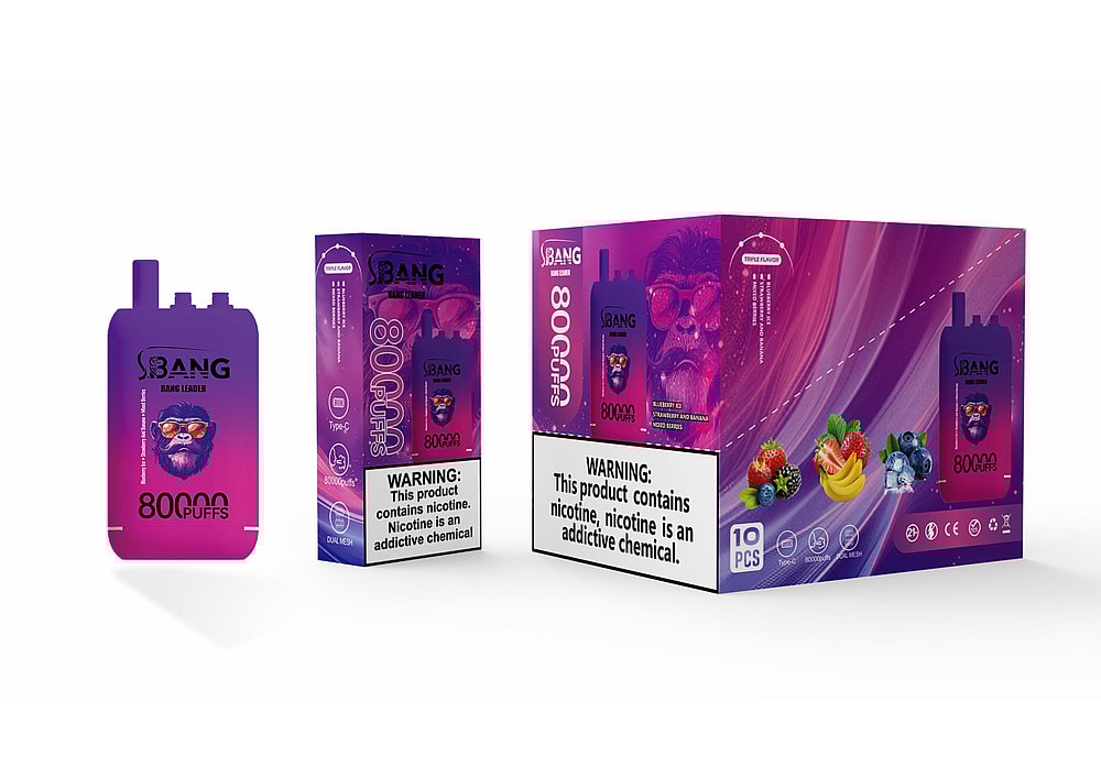 A Vibrant Vape Product Packaging Featuring A Purple Vape Device Labeled With '80000 Puffs' And A Cartoonish Monkey Wearing Sunglasses, Alongside A Colorful Box Displaying The Same Branding And Warnings About Nicotine Addiction, With Fruit Illustrations In The Foreground.