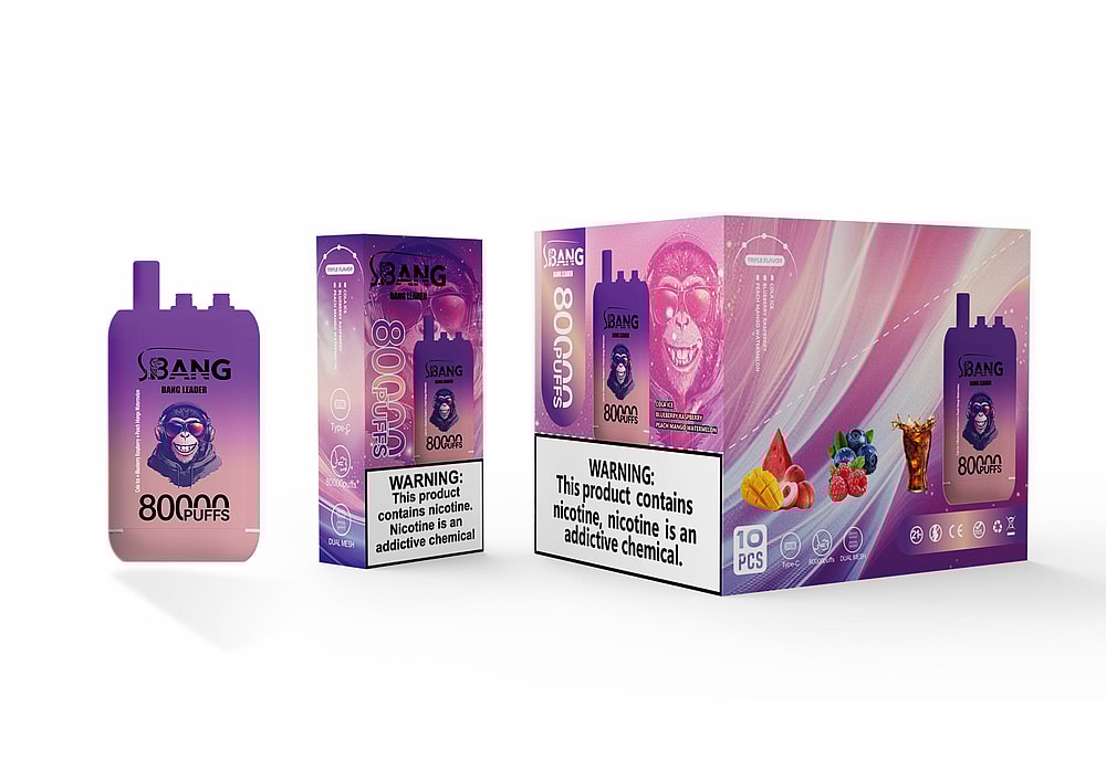 A Packaging Box For Bang Vape, Featuring A Purple Design With The Text '80,000 Puffs', An Illustration Of A Vape Device, And A Warning About Nicotine, Accompanied By Images Of Fruit Like Berries And Mango, Indicating The Product Is Flavored.