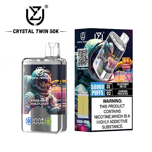 A clear vape device labeled 'CRYSTAL TWIN 50K' featuring an astronaut design, displaying an electronic screen with puff indicators, paired with a colorful package that shows two flavors: 'Blueberry on Ice' and 'Summer Peach Ice', along with a nicotine warning.