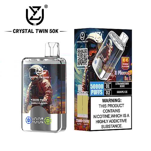 The image showcases a clear vape device labeled 'CRYSTAL TWIN 50K,' designed for 50,000 puffs and featuring double flavor options of Strawberry Kiwi and Grape Ice, alongside a graphic of an astronaut on the front and a warning about nicotine addiction on the side.