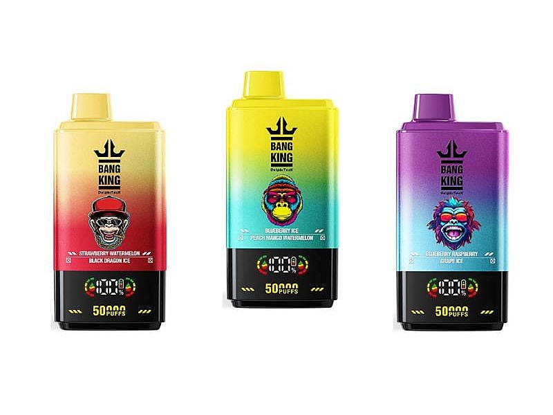 Three colorful vape devices from Bang King, featuring distinct designs: the left device in red and gold labeled 'Strawberry Watermelon Black Dragon Ice', the middle in yellow with 'Blueberry Ice Peach Mango Watermelon', and the right in purple showcasing 'Blueberry Raspberry Grape Ice', all indicating 50,000 puffs on their display.
