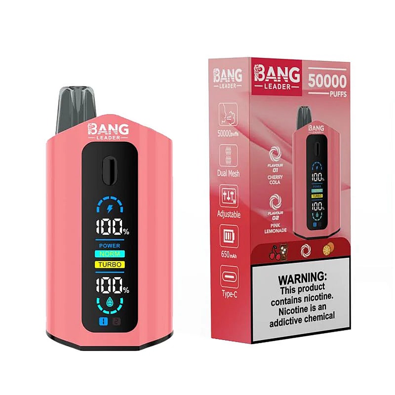 A pink Bang Leader vape device with a digital display showing battery level and modes, next to its box featuring graphics that highlight flavors 'Cherry Cola' and 'Pink Lemonade', as well as a warning about nicotine addiction.