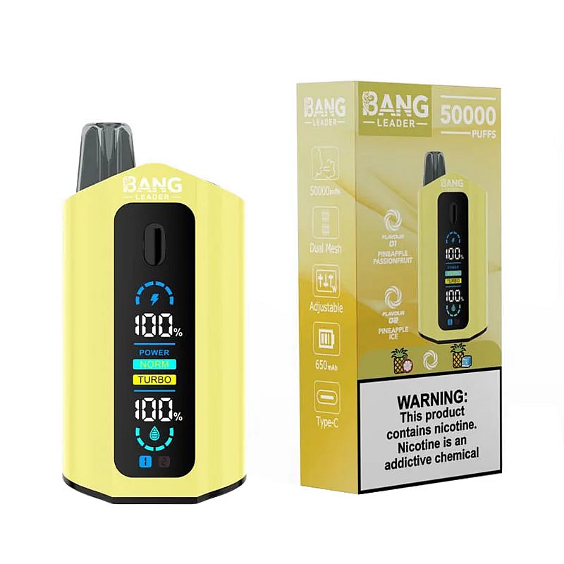 A bright yellow vaping device with a digital display showing battery percentage and mode settings, standing next to its packaging, which highlights its 50,000 puffs capacity and includes warning labels about nicotine addiction.